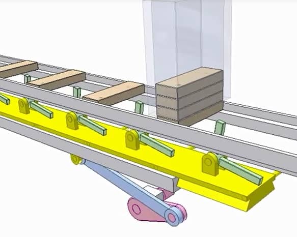 Design And Fabrication Of Industrial Conveyor Using Four Bar Mechanism 