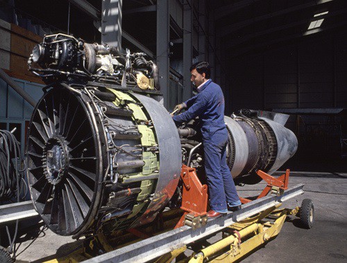 Maintenance engineer works on jet engine at the Marka airport in Amman Jordan.